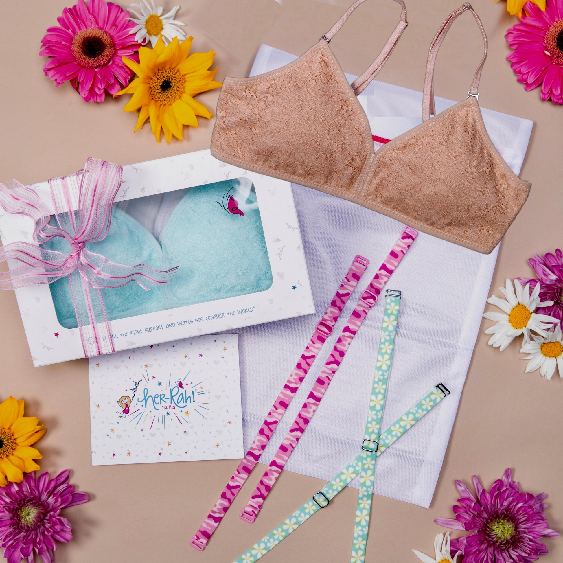 The Deluxe Bra Bundle includes 1 Bra, 2 additional sets of our detachable & interchangeable straps and 1 mesh laundry bag. All items come carefully packed into a gift box with our signature pink bow and card from the Her-Rah! Team to celebrate!